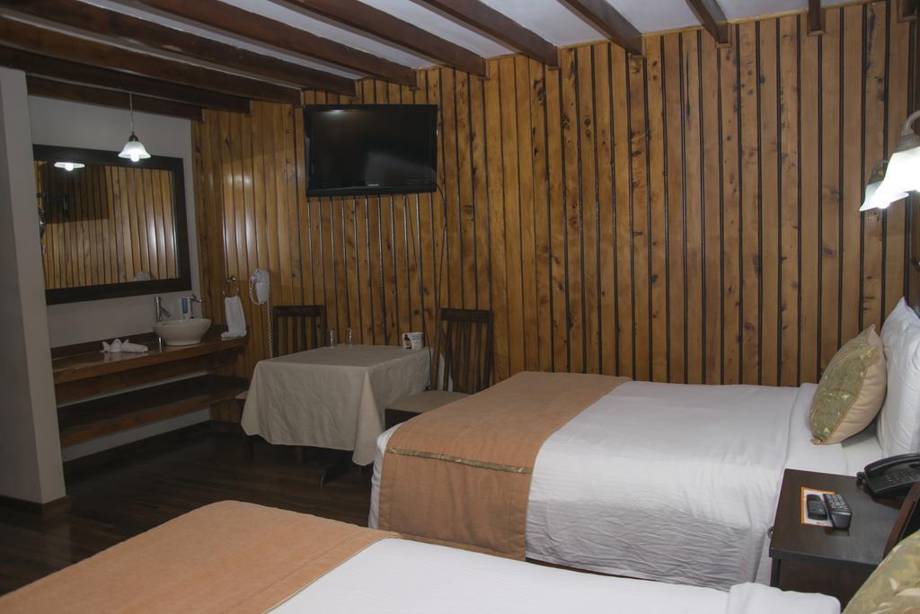 Hotel Chalet Tirol Heredia Habitación foto